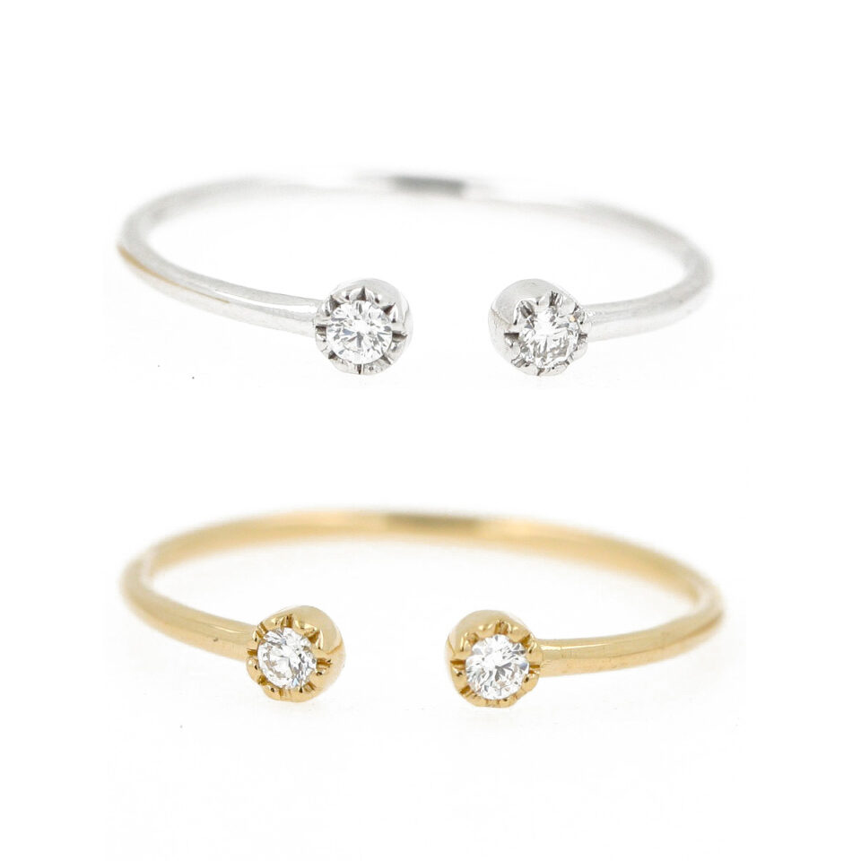 anelli aperti in oro bianco o giallo con due diamanti simmetrici